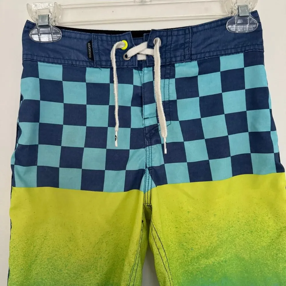 Quiksilver Board Shorts Featuring a Checkerboard Top and a Gradient Bottom